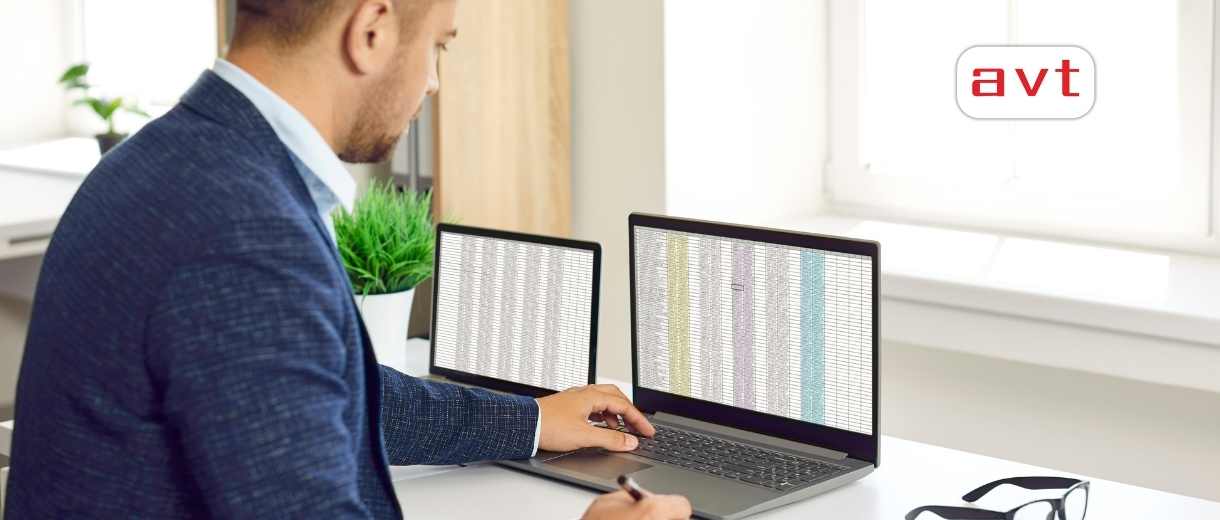 busy businessman working in office with Excel spreadsheet