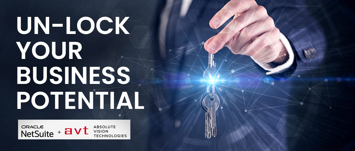 Businessman in suit holding over a key